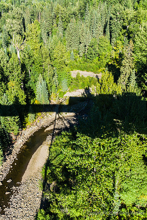 Shadow Of Ahbau Creek Trestle And Train