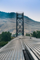 North Thompson river RR Bridge in Kamloops BC. After crossing the bridge trains can go right into downtown Kamloops and join the CP line to Banff or go left on the CN line to Jasper, our route.