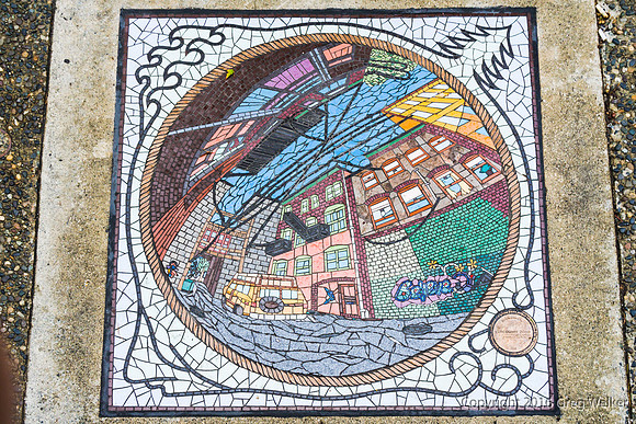 Tile Murals In The Sidewalk