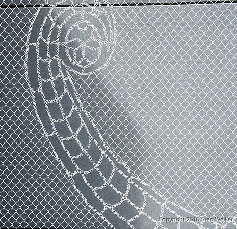 Art Woven Into Chain Link Fence.