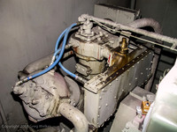 Air compressor.  Provides air for the breaking system and other functions.