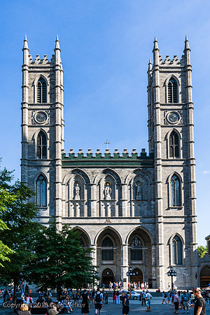 Notre-Dame Basilica of Montreal and Place de Armes Square.